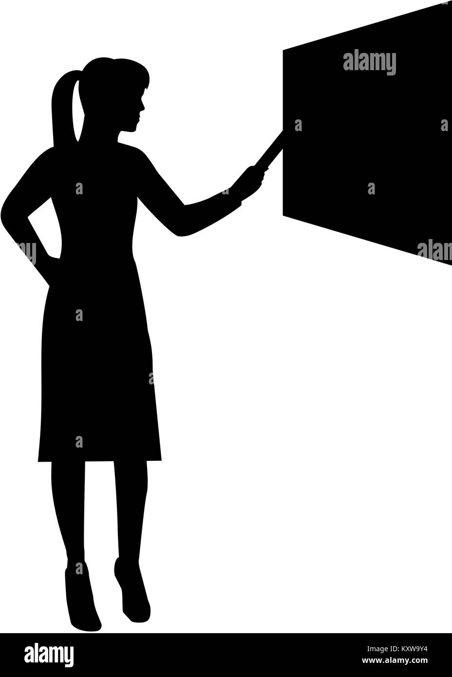 Female teacher at blackboard silhouette Stock Photo