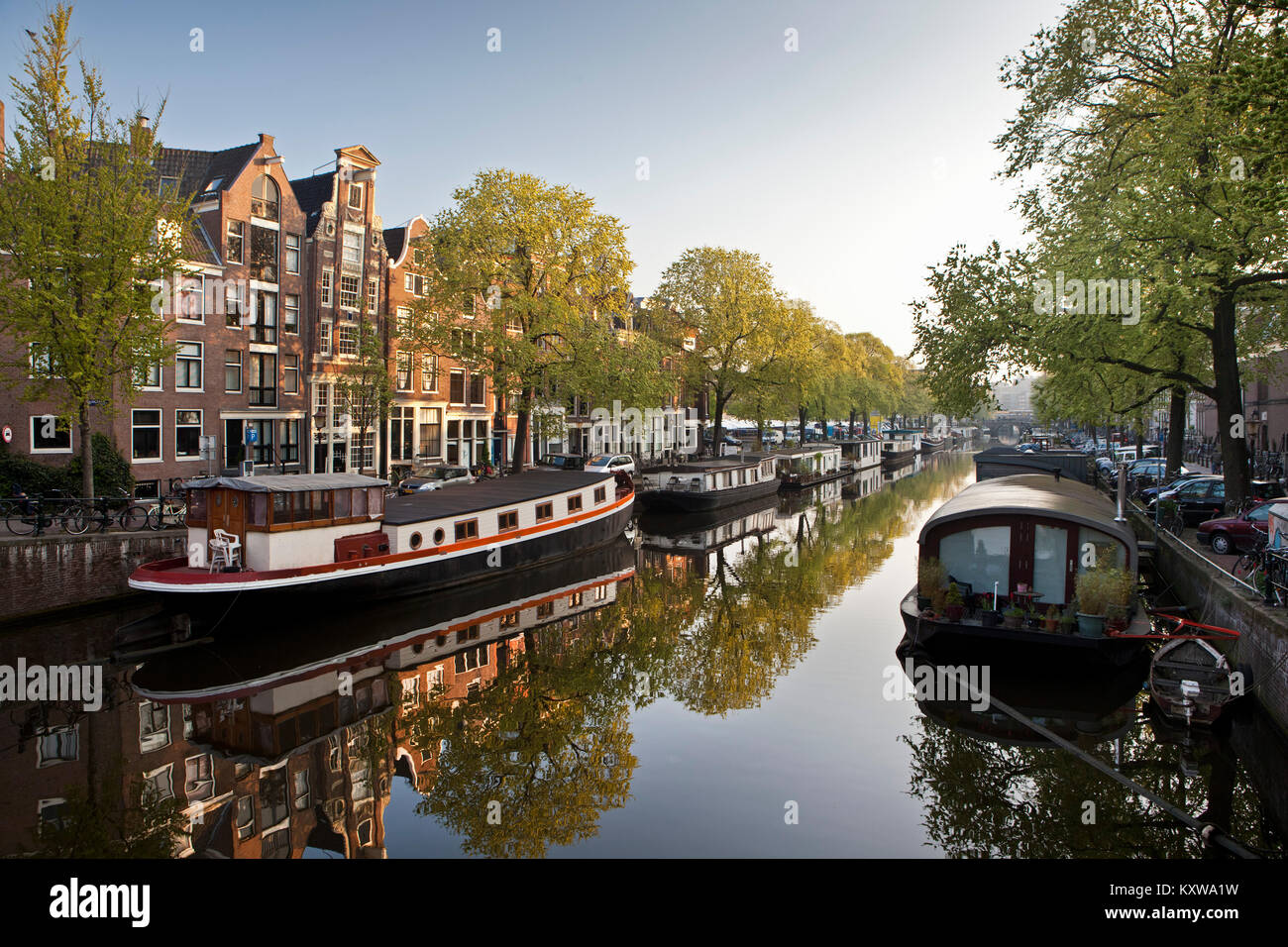 The Netherlands, Amsterdam, 17th century houses and houseboats at canal called Prinsengracht. Unesco World Heritage Site. Stock Photo