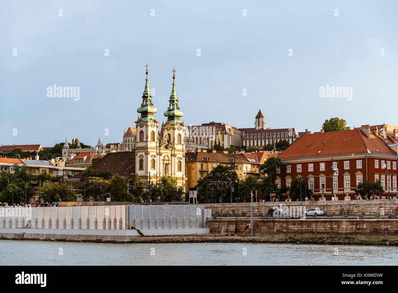 Budapest, Hungary - August 12, 2017: Cityscape of Buda with the church of saint Ann from Danube River at sunset in Budapest Stock Photo