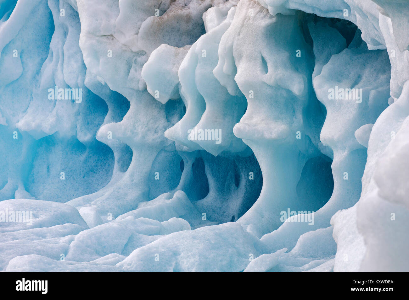 Ice structure of melting iceberg in the Arctic Ocean, Svalbard / Spitsbergen, Norway Stock Photo