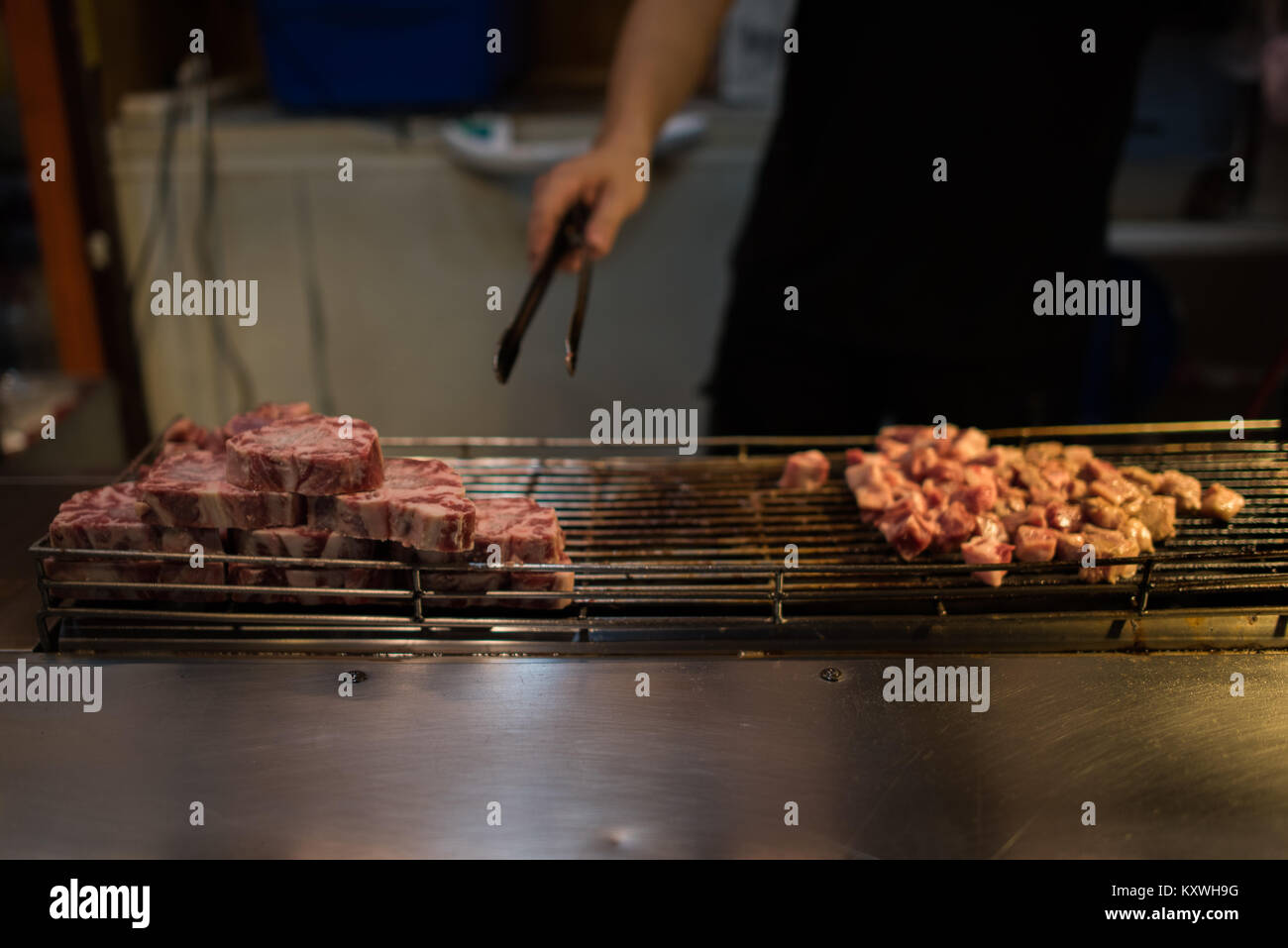 asian style barbecue cooking with flame torch burner , very delicious street food Stock Photo