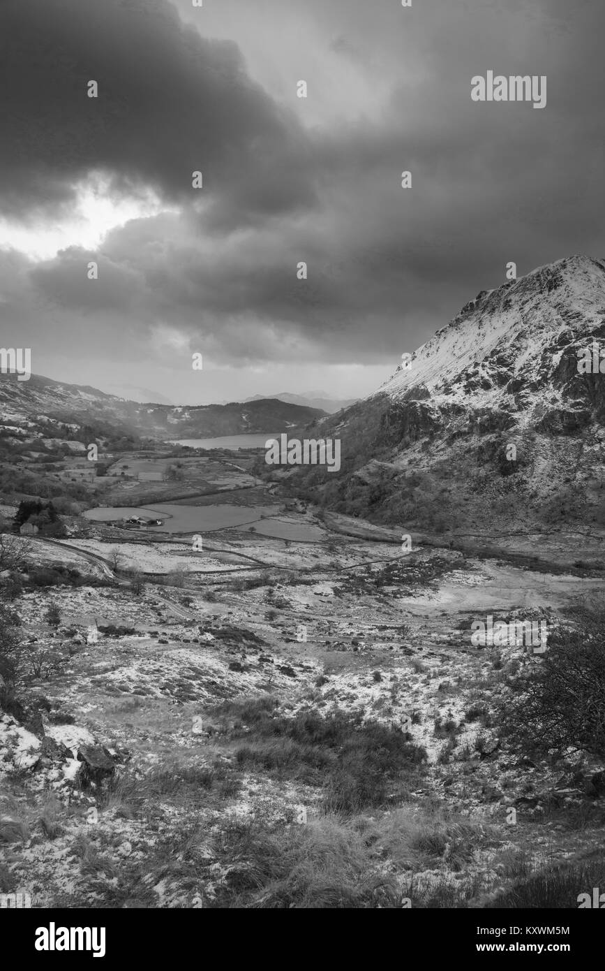 Beautiful black and white landscape image in Winter of Llyn Gwynant in ...