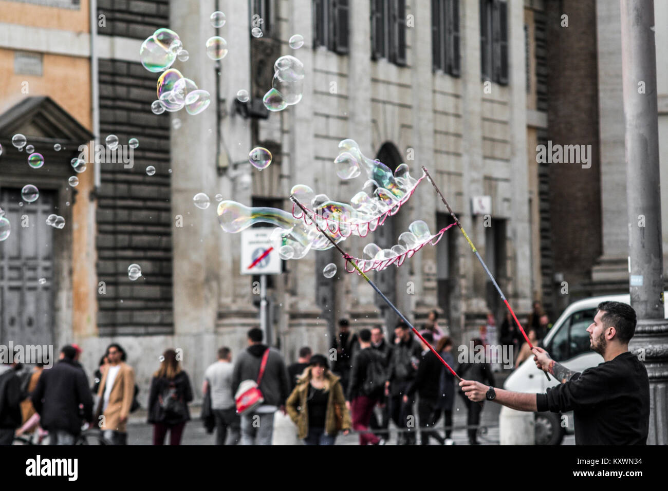 Rome, November 2017 Italy: An artist is making big soap bubbles for ...