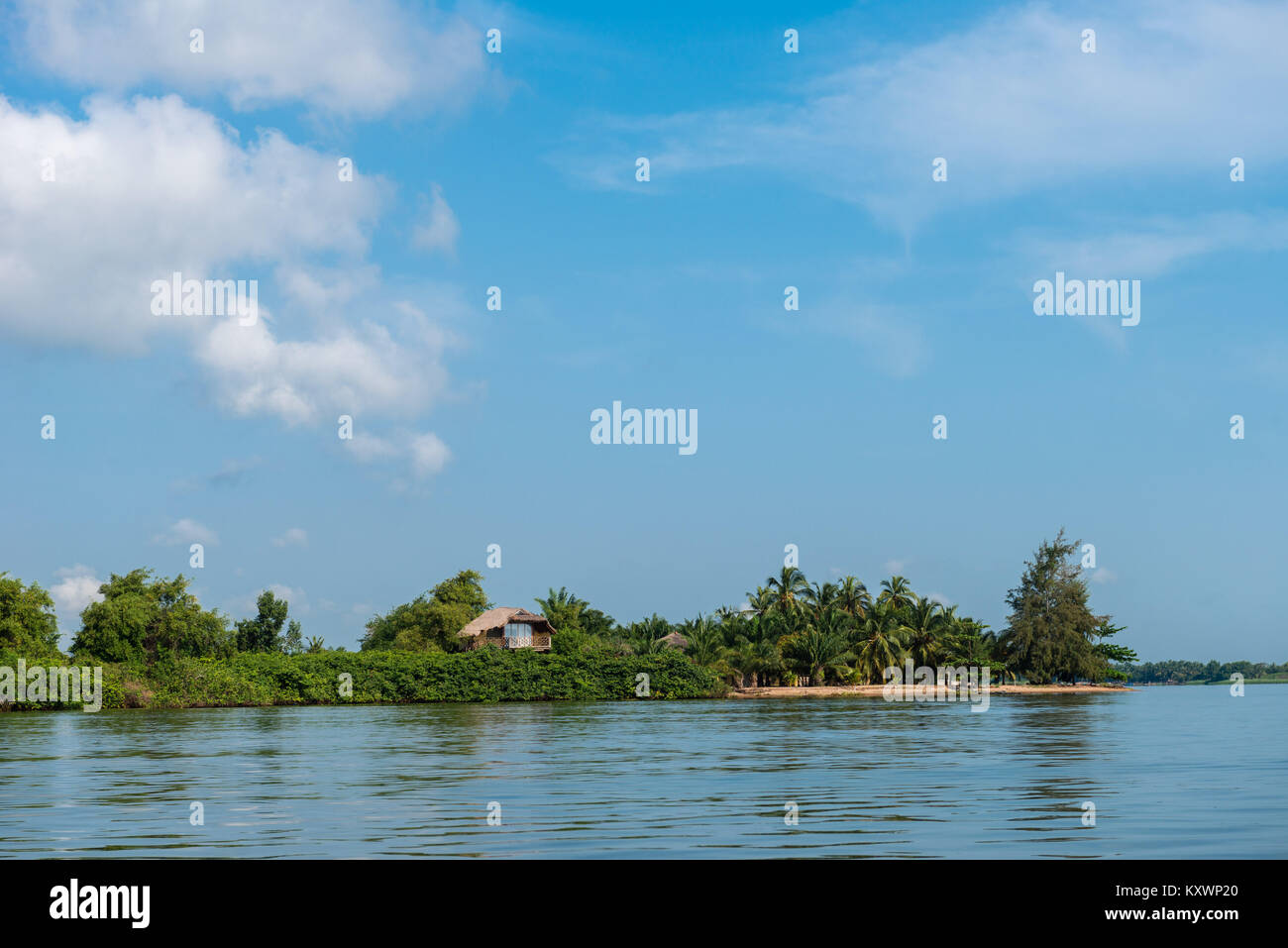Private homes on a Volta River island, Ada Foah, Greater Accra Region, Ghana, Africa Stock Photo
