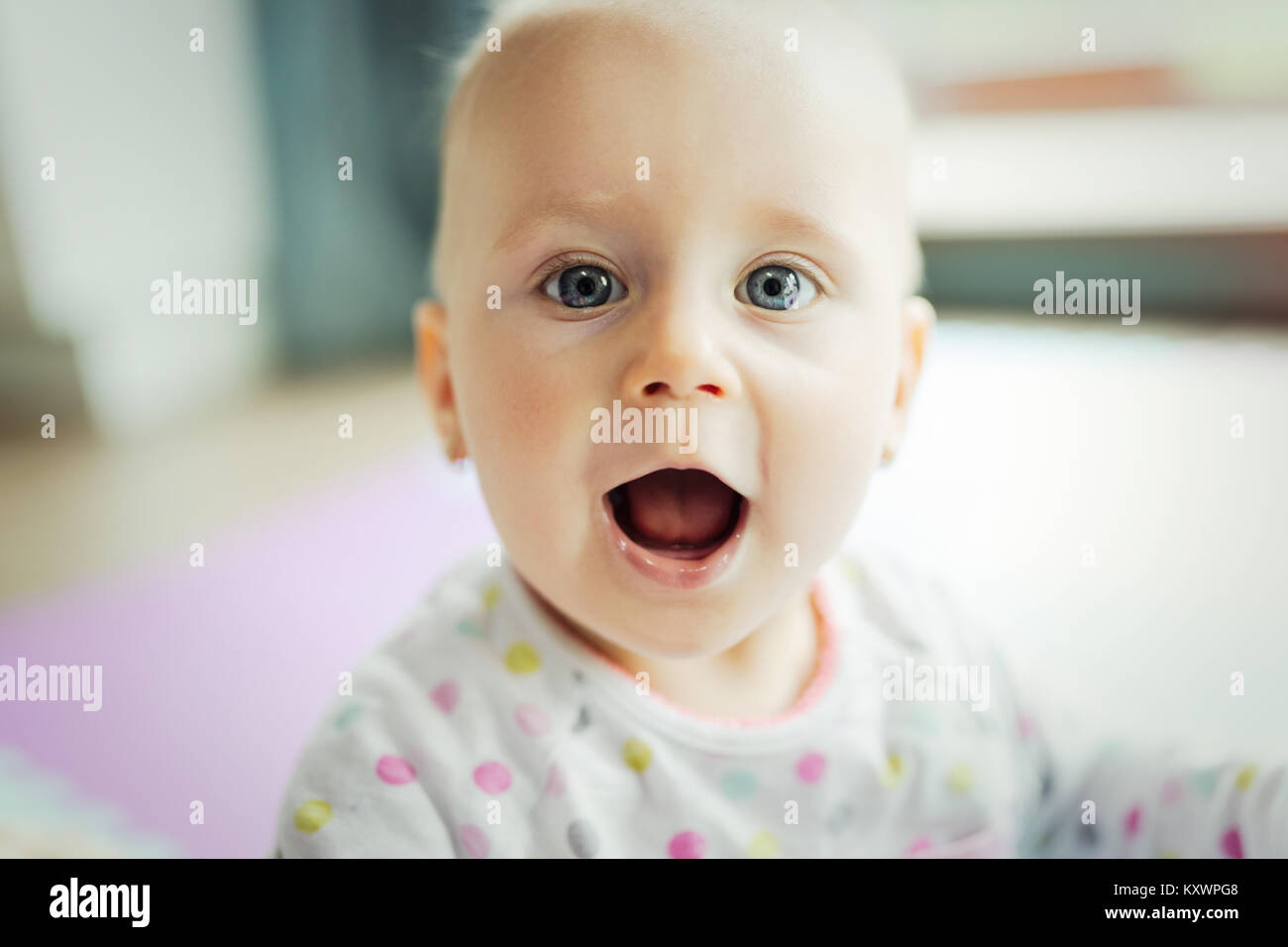 Portrait of cute happy baby girl Stock Photo