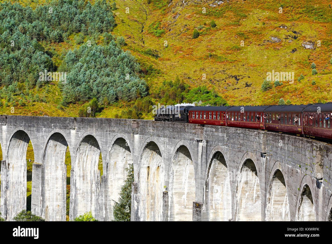 Picture taken from on the Jacobite Express steam train passing over the Glenfinnan Viaduct on the West Highland Line, Scotland Stock Photo