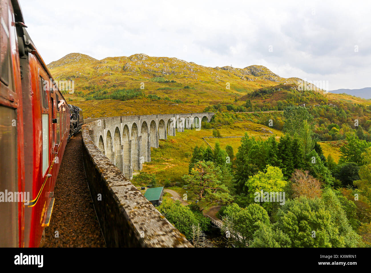 Picture taken from on the Jacobite Express steam train passing over the Glenfinnan Viaduct on the West Highland Line, Scotland Stock Photo