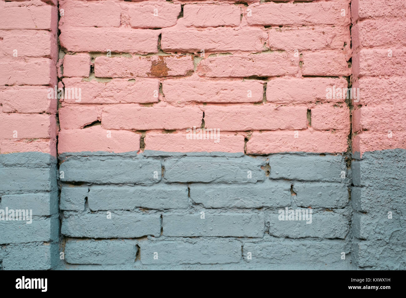 Pink and gray painted brick wall detail Stock Photo