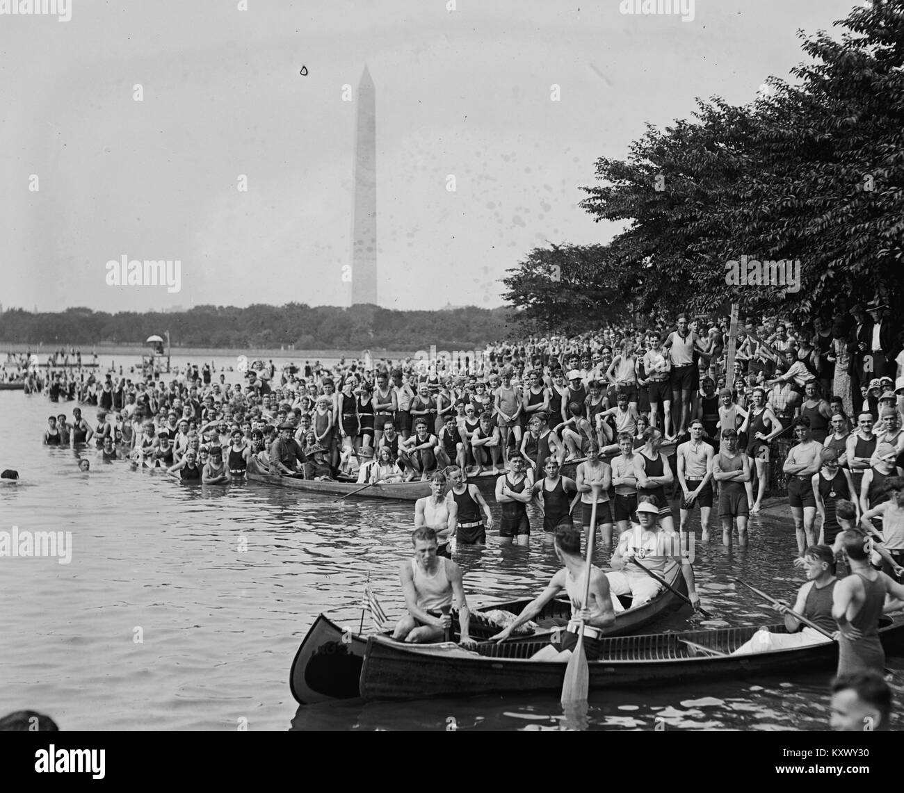 Canoe Regatta & Water Carnival with Washington Monument in the Background Stock Photo