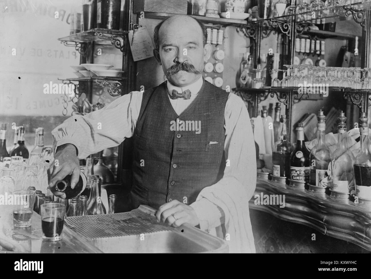 French Bartender Serving Another Drink Stock Photo