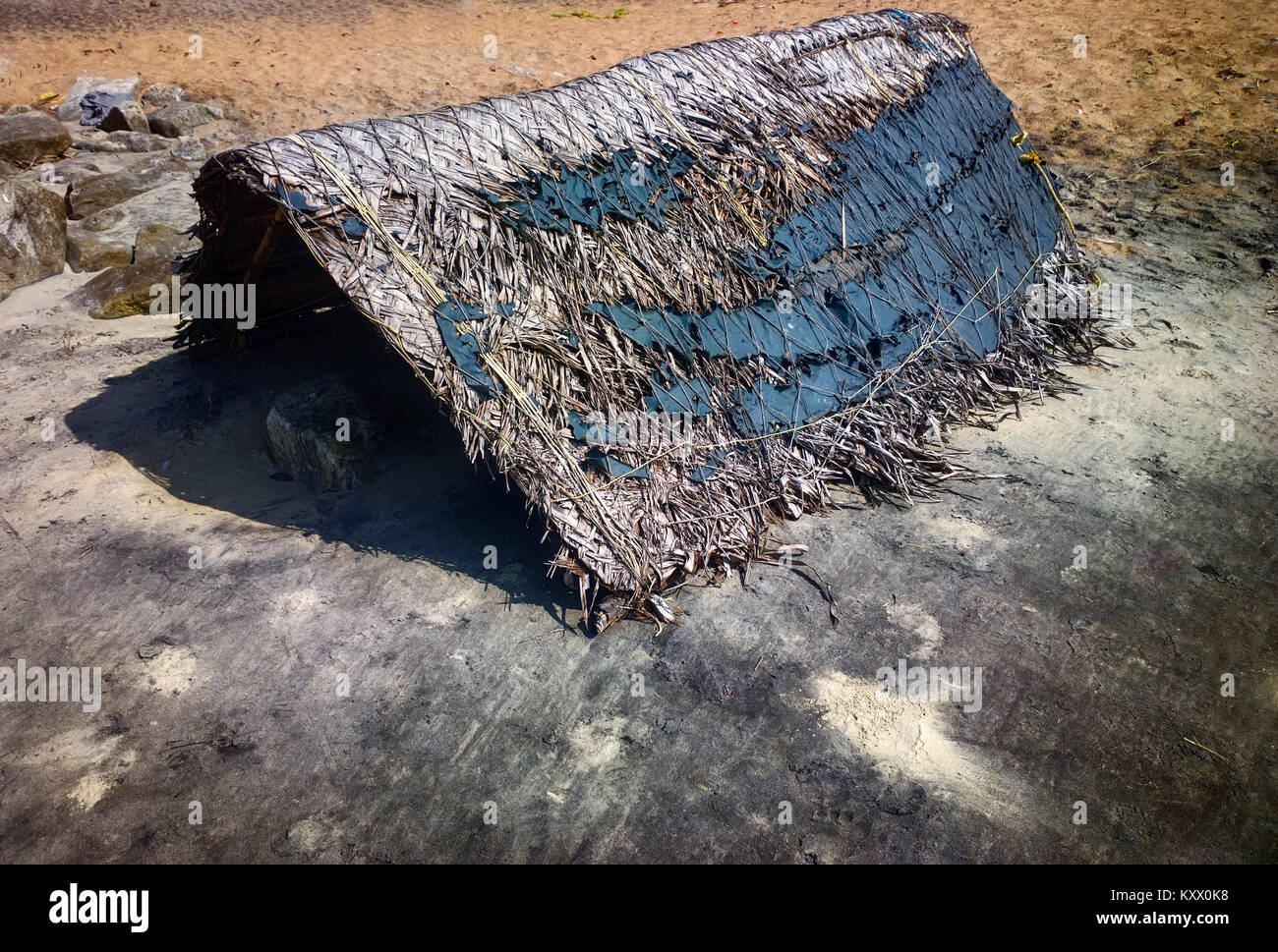 Fisherman's pandal covered with woven mat on shores of Arabian sea. Kerala Stock Photo