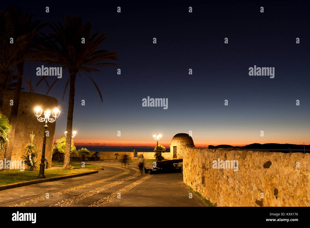 Scenic view of Bastioni Pigafetta against romantic autumnal twilight. Alghero, Sardinia. Italy Stock Photo