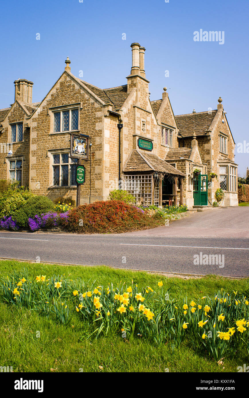 The Lansdown Arms public house with spring flowers in Derry Hill Calne