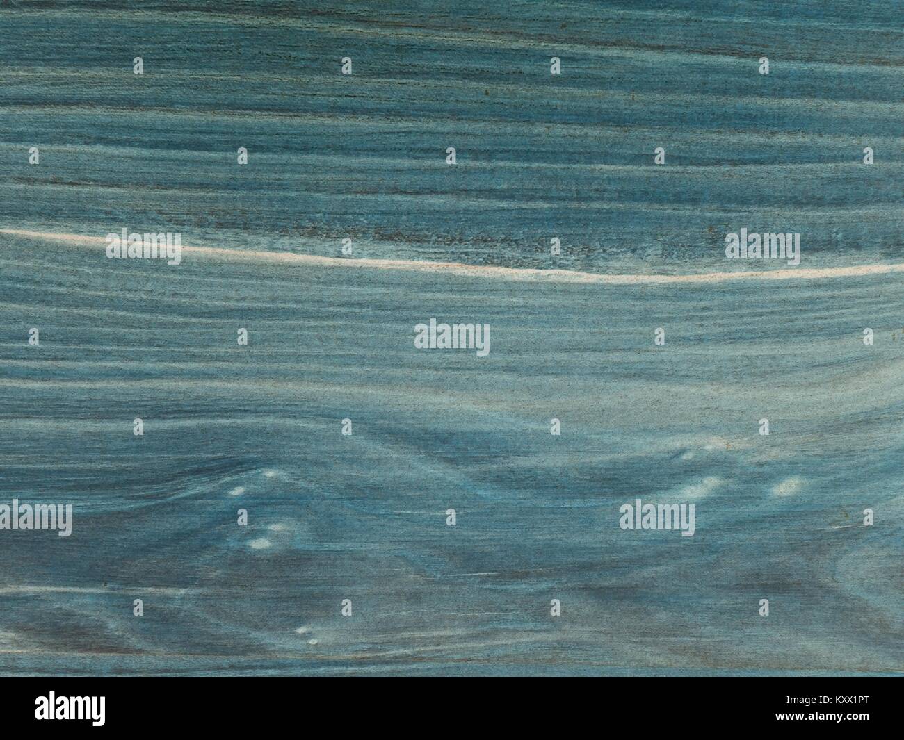 The old table top, worn out stained navy blue with shades. Fine
