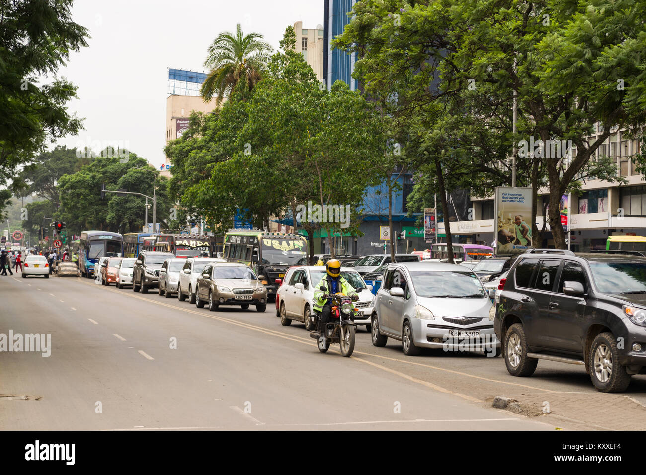 A long queue of vehicles wait on Kenyatta Avenue during a normal weekday, Nairobi, Kenya Stock Photo