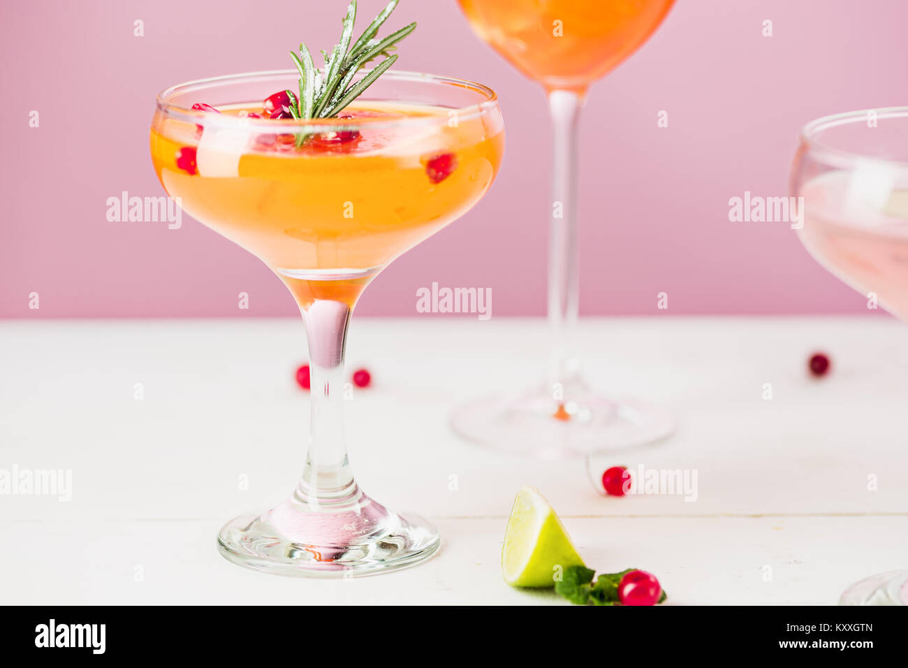 The rose exotic cocktails and fruits on pink Stock Photo