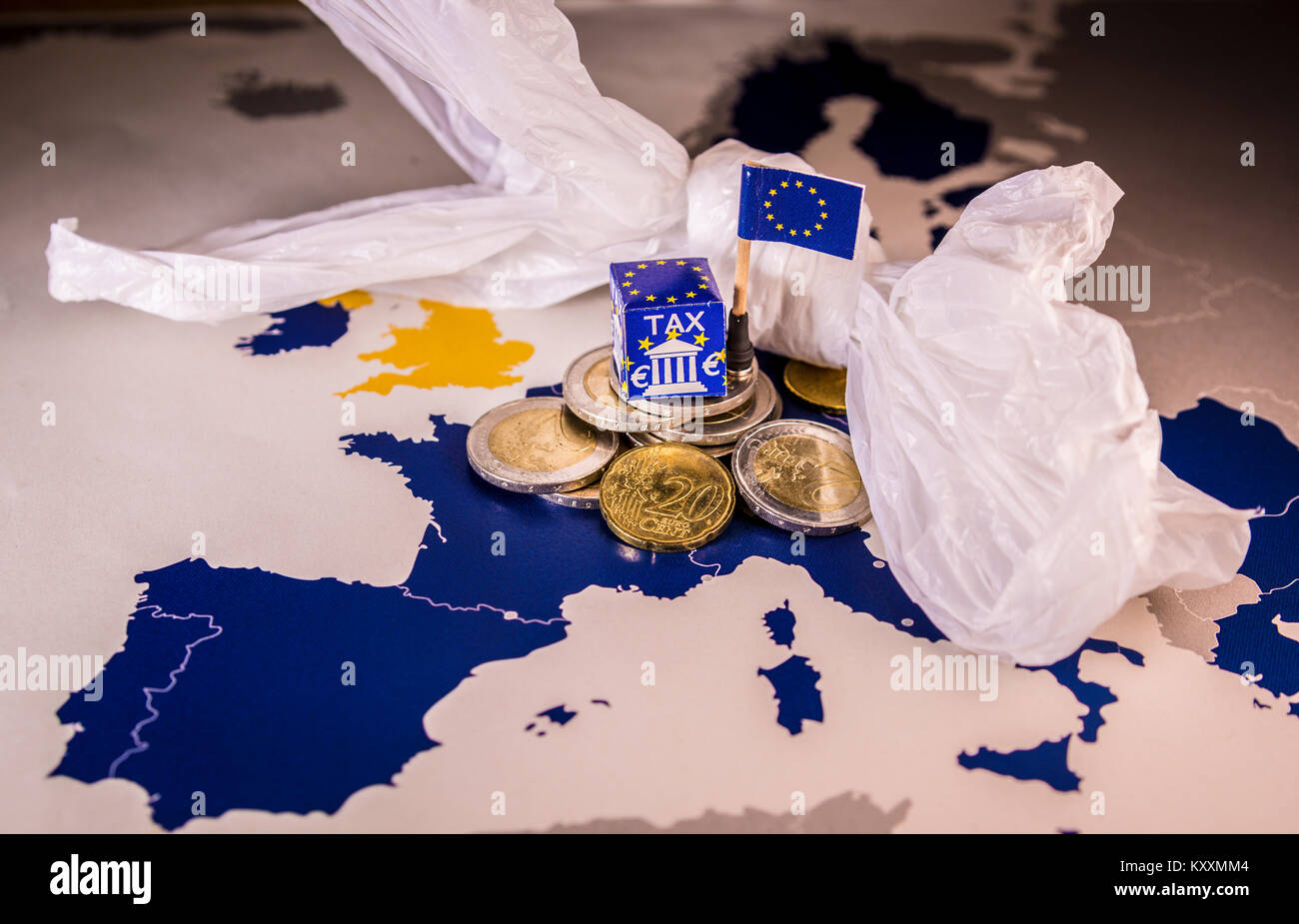 EU map with euro coins and a plastic bag symbolizing european plastic tax regulation.The