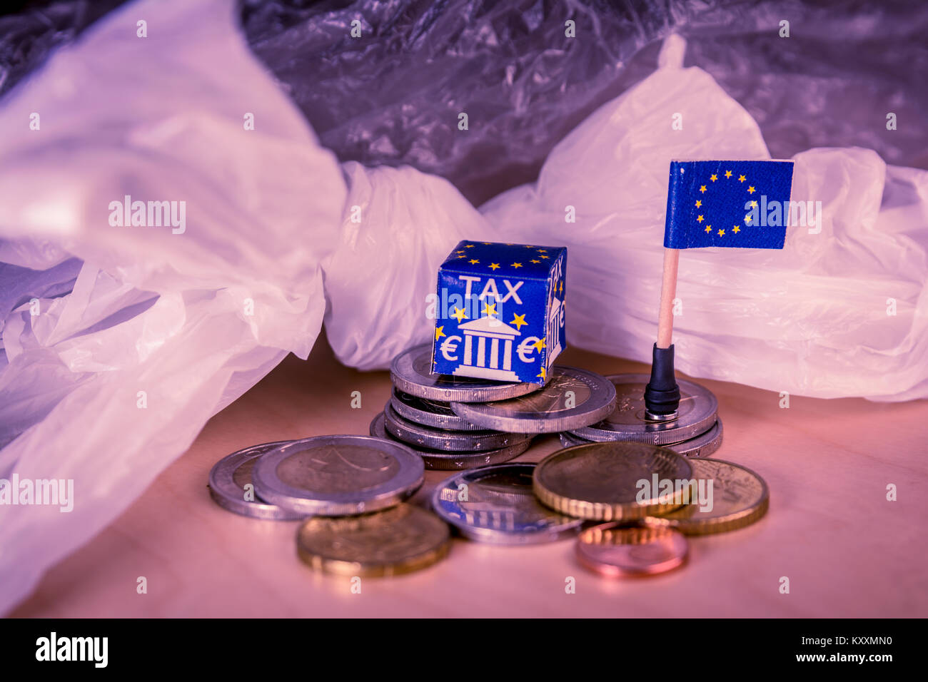 EU map with euro coins and a plastic bag symbolizing european plastic tax regulation.The