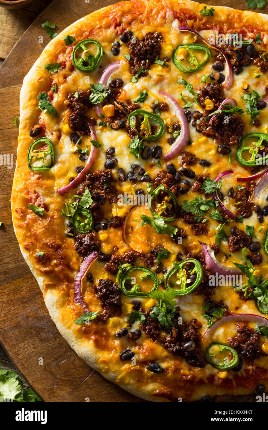 Homemade Spicy Mexican Taco PIzza with Cilantro and Chorizo Stock Photo