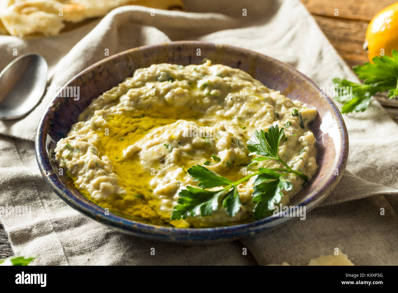 Savory Homemade Mediterranean Baba Ganoush with Olive OIl and Parsley Stock Photo