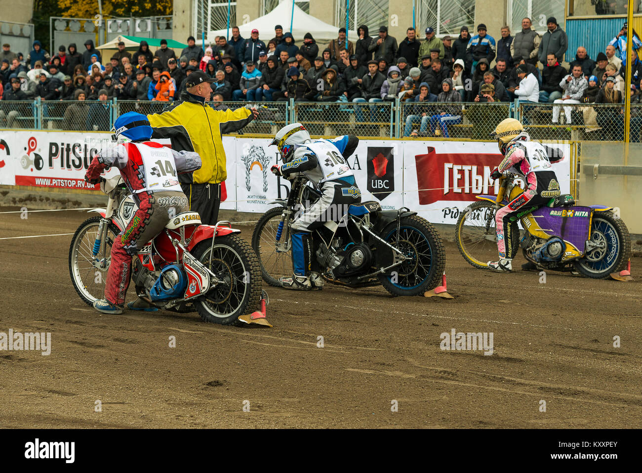 Rivne, Ukraine - 11 October 2015: Unknown riders prepares for the start at the Open Cup Speedway to the day of the city Rivne Stock Photo