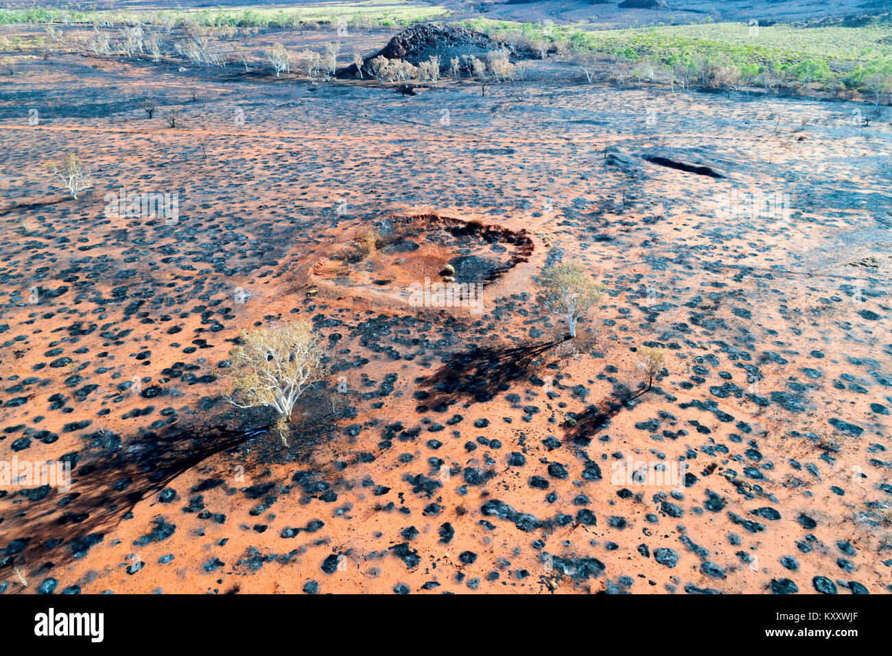 Dry water dam in burnt landscape, Pilbara, Western Australia Stock ...