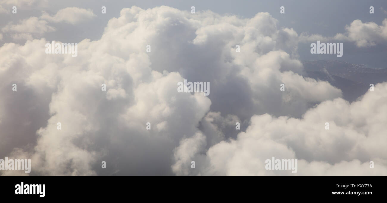 Clouds white and grey on dark blue sky background. Aerial photo from ...
