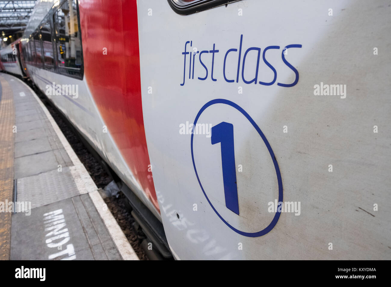 Detail of First Class door on Virgin Trains locomotive from London King's Cross on East Coast Main line  at platform at Waverley Station in Edinburgh, Stock Photo