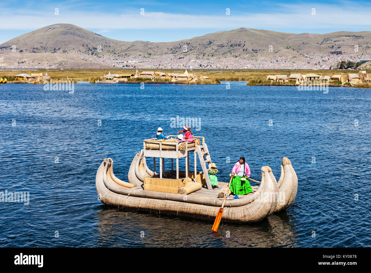 PUNO, PERU - MAY 14, 2015: Totora boat on the Titicaca lake near Puno, Peru Stock Photo