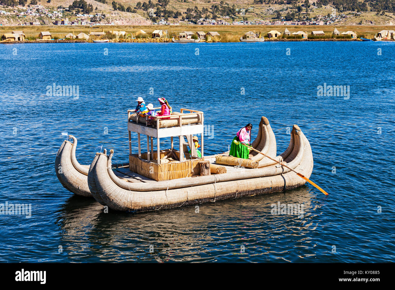 PUNO, PERU - MAY 14, 2015: Totora boat on the Titicaca lake near Puno, Peru Stock Photo