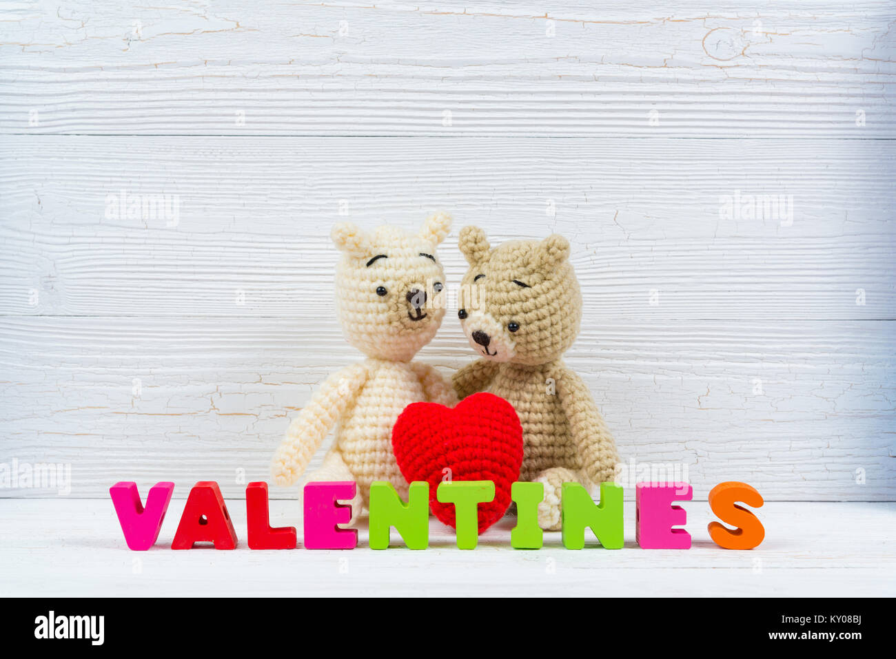 Sweet couple teddy bear doll in love with valentine text and red