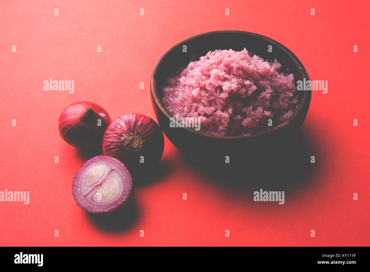 Onion Sauce or paste, in white or black ceramic bowl with raw cut Pyaj ...