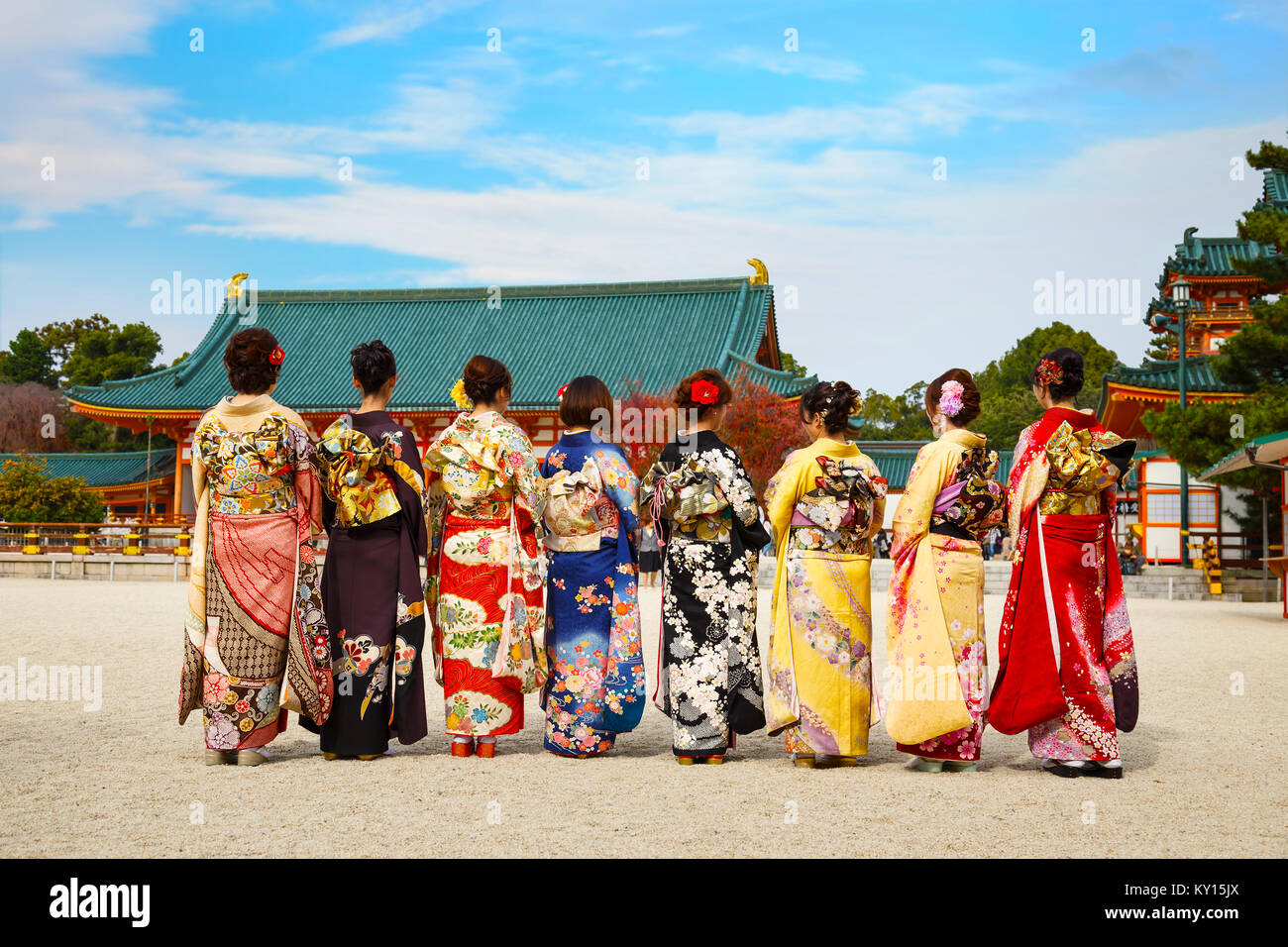JAPAN - NOVEMBER 22 2015: Beautiful Japanese ladies in traditional kimono dress at Heian-jingu shrine, kyoto Stock Photo