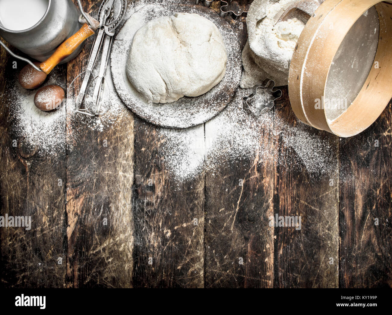 Dough made from fresh milk flour. On a wooden table Stock Photo - Alamy