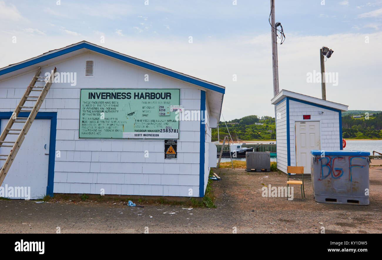 Fading harbour fees sign, Inverness Harbour, Inverness County, Cape Breton Island, Nova Scoatia, Canada. Stock Photo