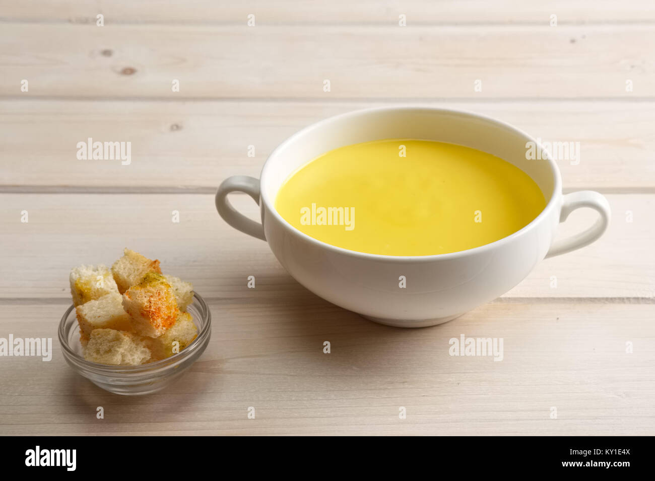 Chicken soup puree with white bread chips Stock Photo Alamy