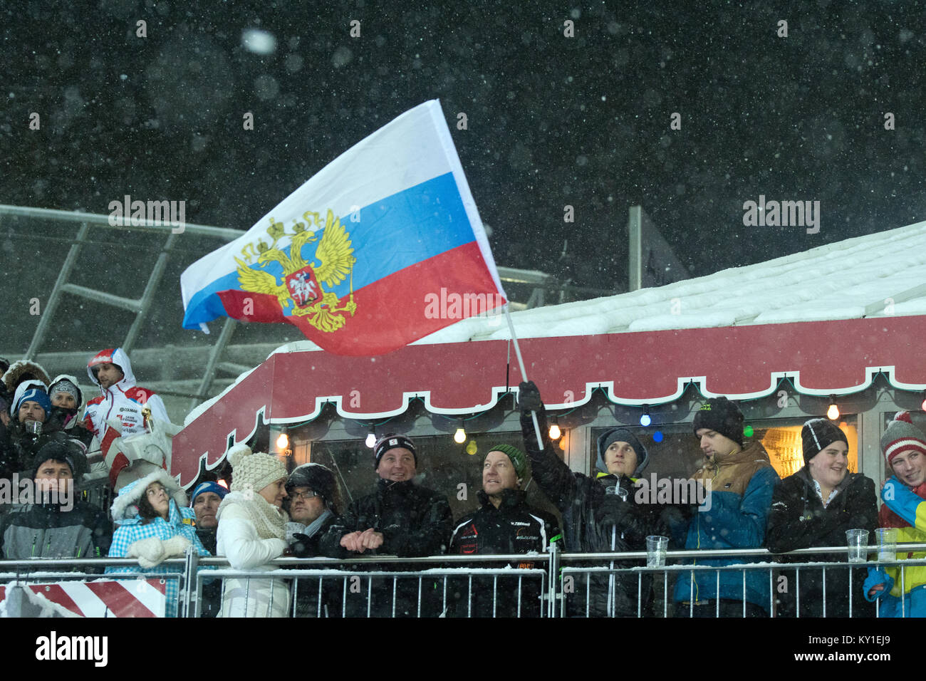 The Russian World Cup alpine ski racer Alexander Khoroshilov won his first World Cup win and went top of the podium to the joy and happiness of the Russian fans in Schladming, Austria. Photo credit: Christoph Oberschneider. Stock Photo
