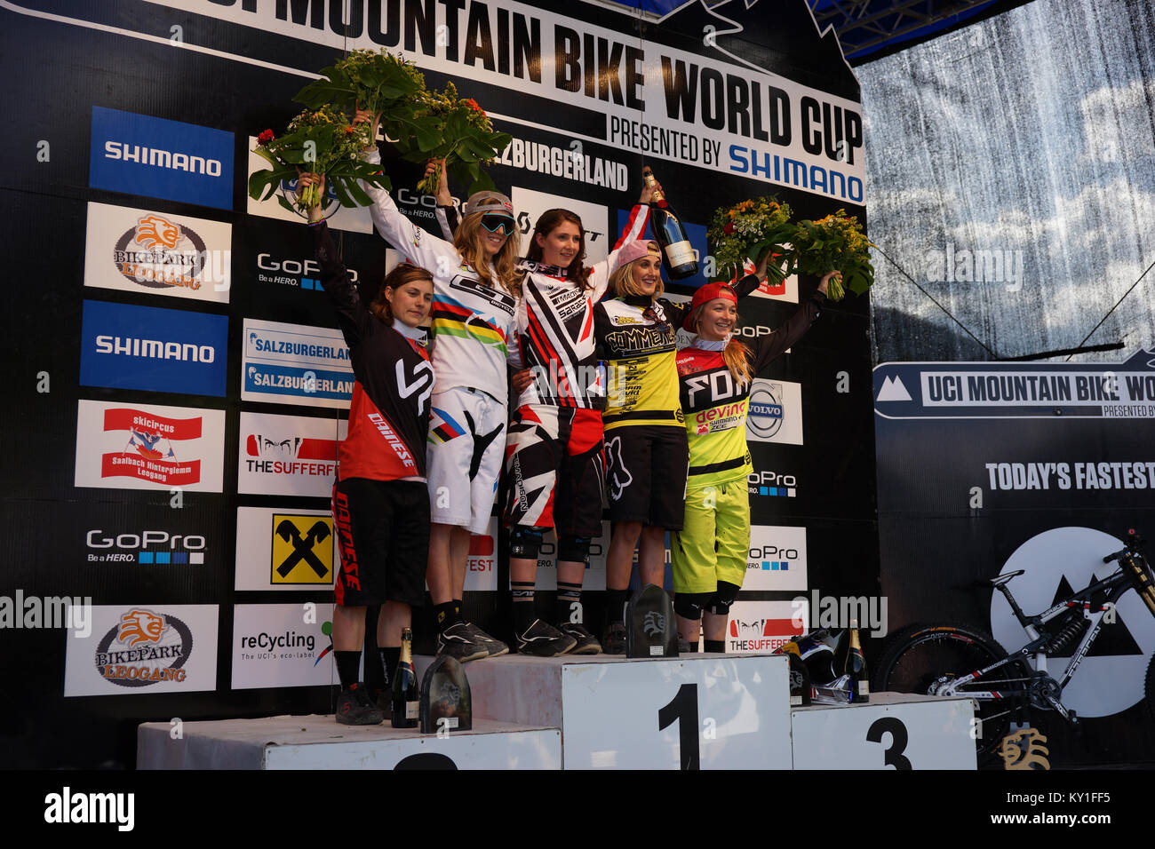 Mountain bikers Manon Carpenter (C) from Madison Saracen Factory Team on the podium with Myriam Nicole (R) from Commencal/Riding Addiction and Rachel Atherton (L) from GT Factory Racing. Gonzales Photo/Christoph Obeschneider. Stock Photo