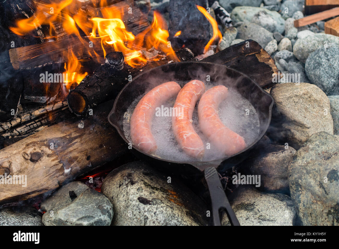 Live Fire Cooking Juicy Sausages Over Campfire Stock Photo Alamy