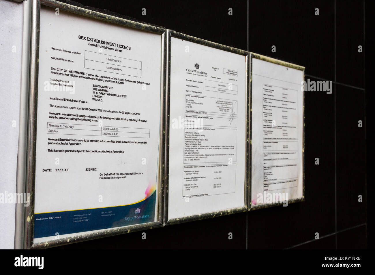London, UK. Licenses from Westminster council displayed on the exterior of The Windmill nightclub. Stock Photo
