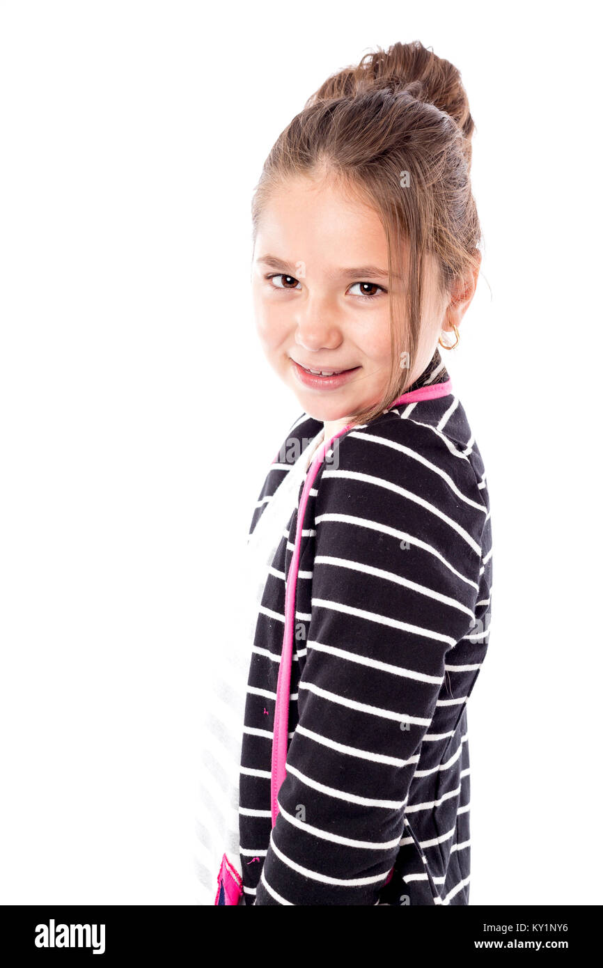 Portrait of a smiling pretty little girl isolated over white background ...