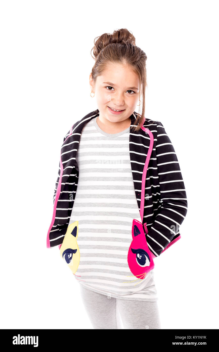 Portrait of a smiling pretty little girl isolated over white background ...