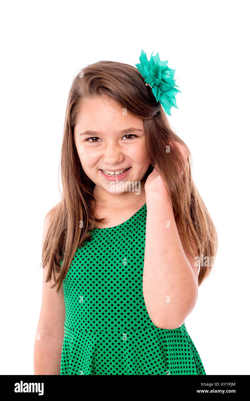 Adorable littel girl posing over white background Stock Photo - Alamy