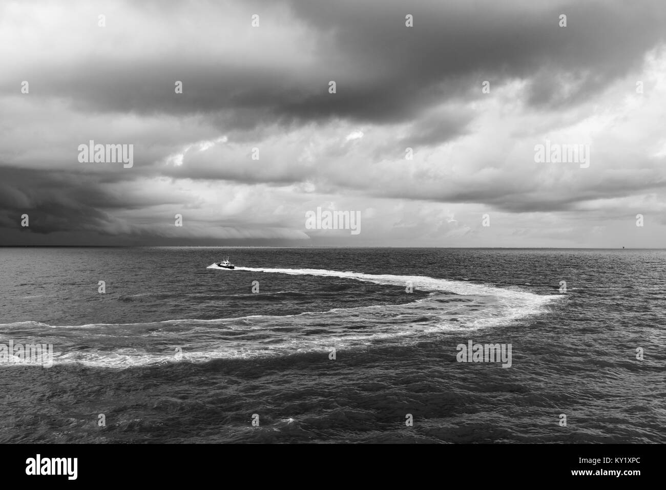 A boat in stormy weather Stock Photo Alamy