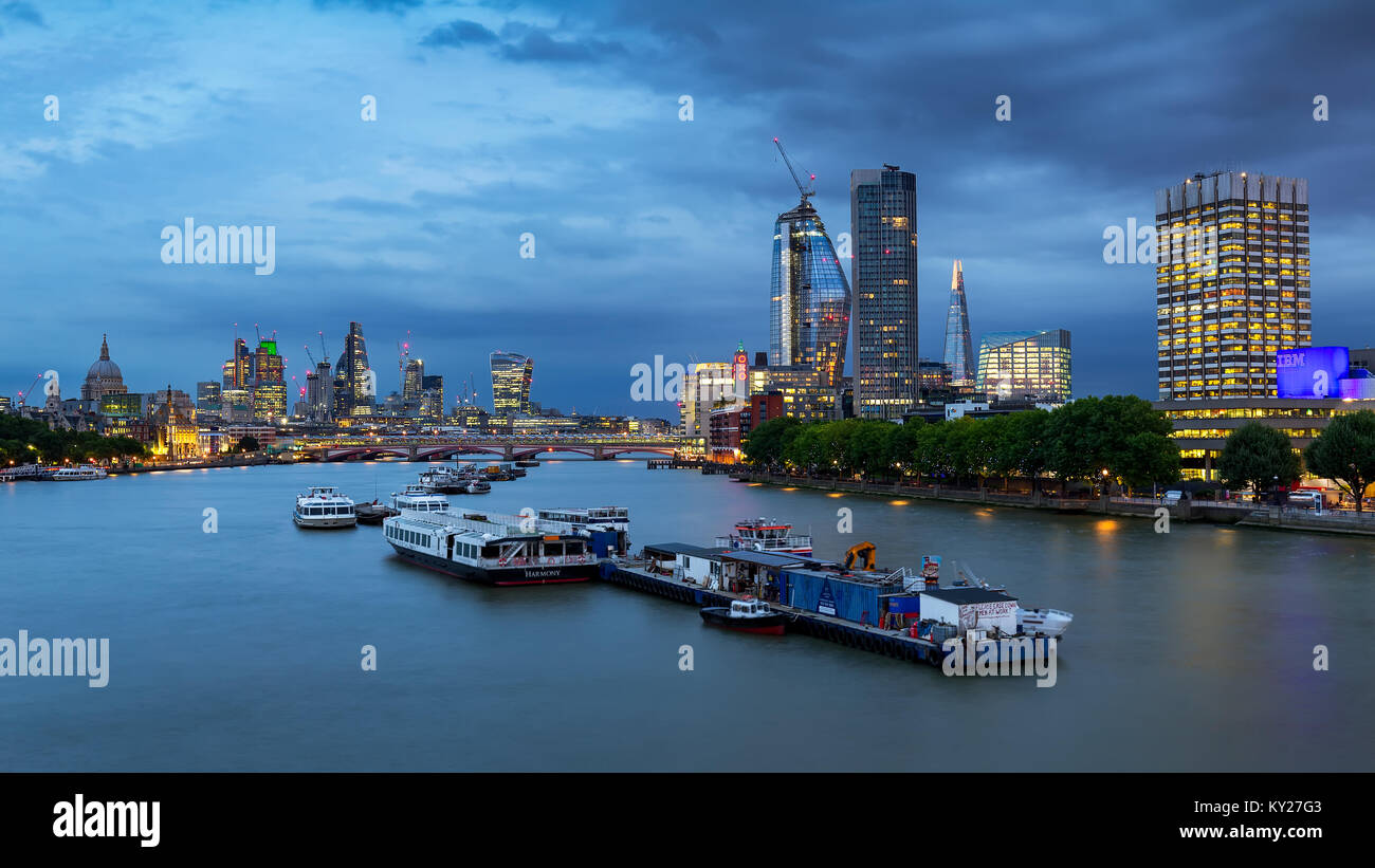 Blue hour view of City of London with St. Paul and Thames in foreground from Waterloo Bridge Stock Photo