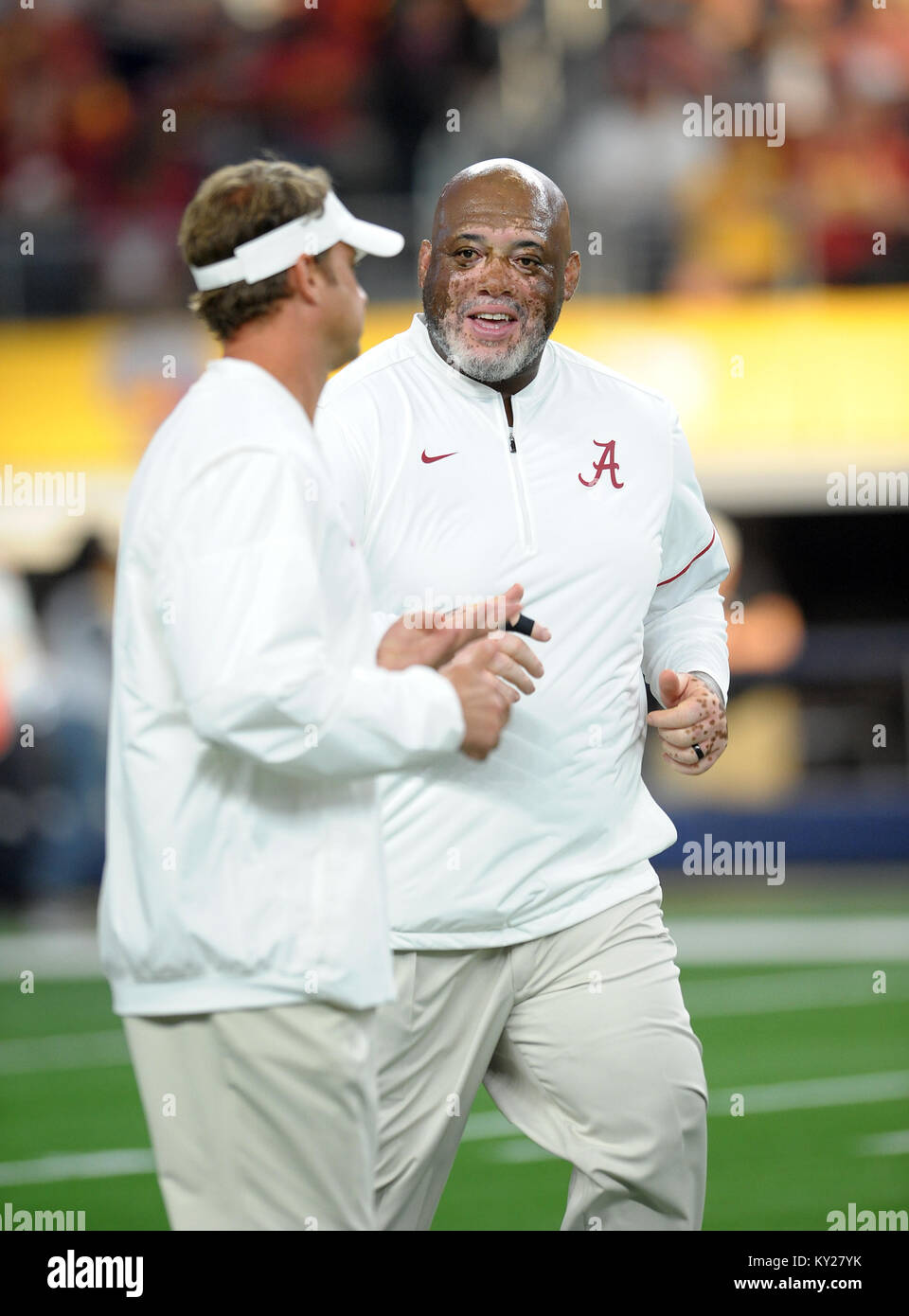 January 11, 2018 Tuscaloosa, AL.(FILE PHOTOS) Alabama defensive line coach Karl Dunbar (pictured here with former offensive coordinator Lane Kiffin) had his Alabama game-day playbook stolen from the team's official hotel in Atlanta where the team was staying at, two days before Alabama defeated Georgia to capture its fifth national championship in nine years, Dunbar reported his backpack stolen to Police.According to a copy of an incident report obtained by The Anniston Star, Dunbar told Atlanta police he left his backpack inside the defensive line meeting room at 12:45 p.m. on Saturday. W Stock Photo