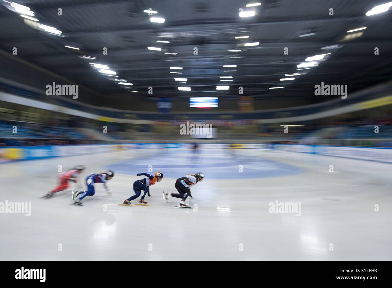 Athletes race at the women's 1500m short track qualifying competition