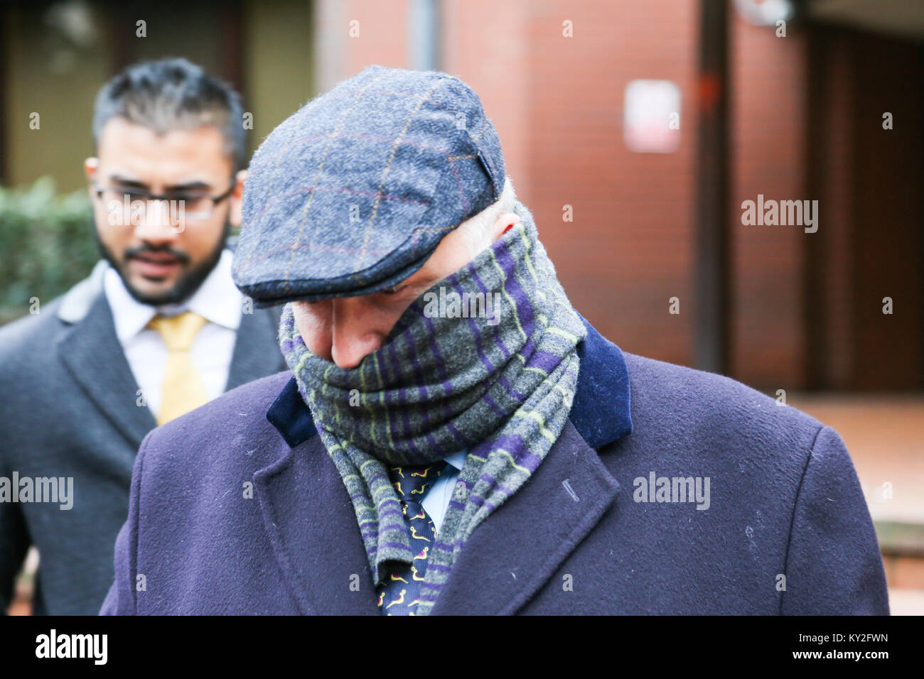 Birmingham, UK. 12th Jan, 2018. Birmingham surgeon leaves Birmingham Crown Court after sentencing. He pleaded guilty to two counts of assault by beating after he wrote his initials on the livers of the two patients without their consent, and for no clinical reason, in 2013 while working as a liver transplant surgeon at Queen Elizabeth Hospital. Credit: Peter Lopeman/Alamy Live News Stock Photo