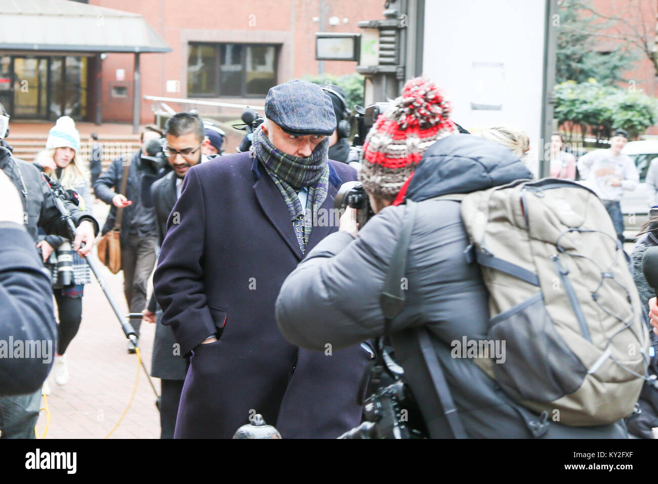 Birmingham, UK. 12th Jan, 2018. Birmingham surgeon leaves Birmingham Crown Court after sentencing. He pleaded guilty to two counts of assault by beating after he wrote his initials on the livers of the two patients without their consent, and for no clinical reason, in 2013 while working as a liver transplant surgeon at Queen Elizabeth Hospital. Credit: Peter Lopeman/Alamy Live News Stock Photo