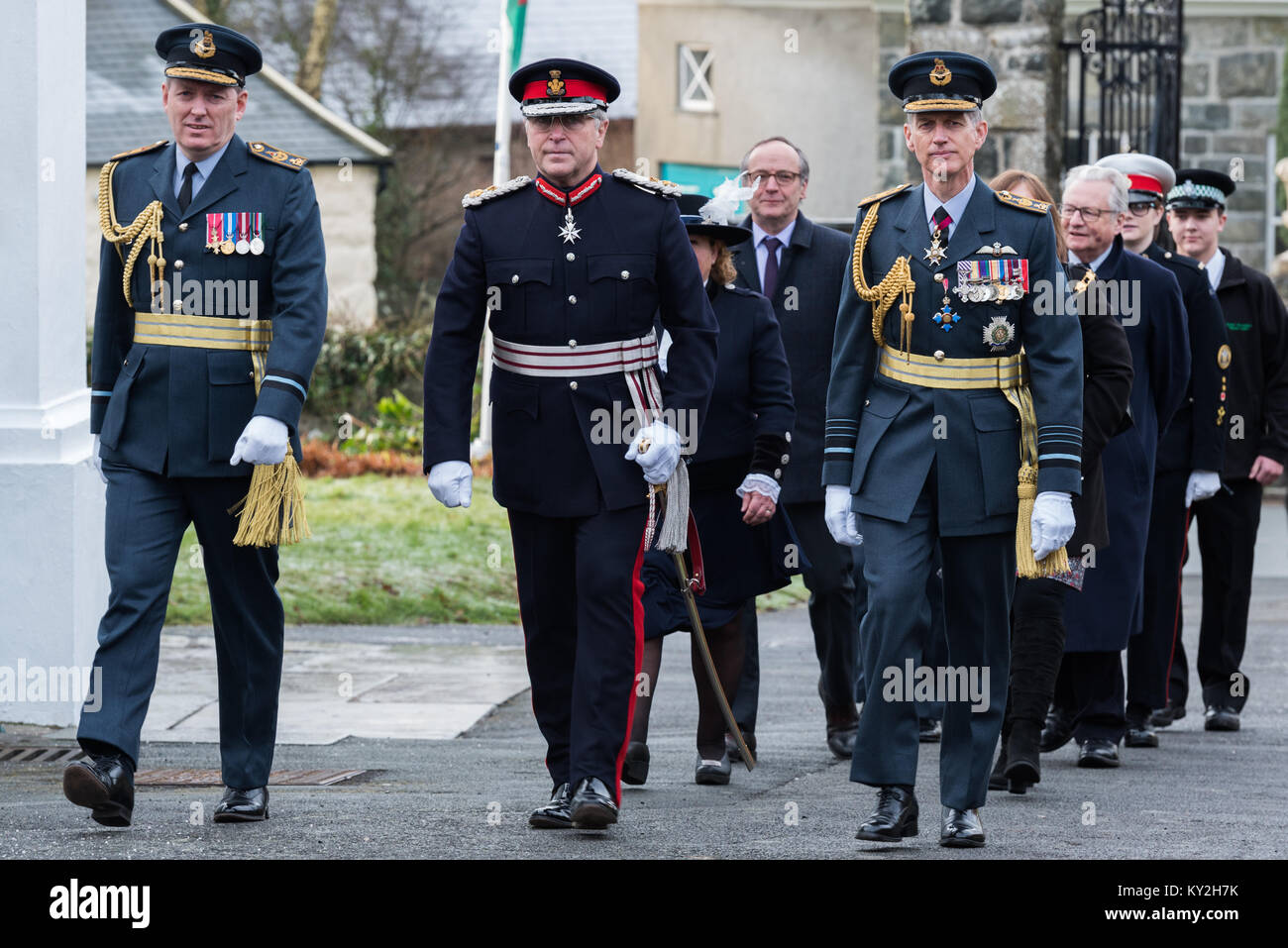 Llanystumdwy, Gwynedd, UK. 12th Jan, 2018. UK. Air Commodore Williams, Air Officer Wales (L) escorting the the Lord Lieutenant of Gwynedd (C) and Chief of the Air Staff (R) Air Chief Marshal Sir Stephen Hillier to the commemoration of Prime Minister David Lloyd George's 1917 decision to create the world's first independent Air Force in 1918. Credit: Michael Gibson/Alamy Live News Stock Photo